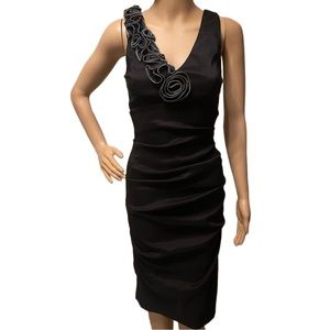 Black BodyCon dress with gorgeous Zipper rosette detail.